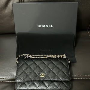 X SOLD OUT X Chanel wallet on chain in black with gold hardware, cavier skin